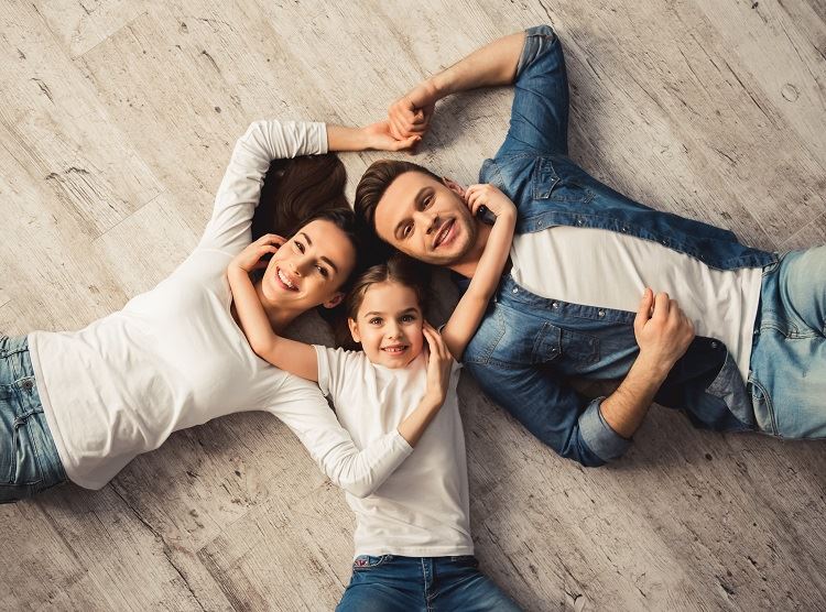family in Utah laying on the ground - Salt Lake City Family Law Attorney